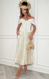 Elegant pleated midi dress for wedding guest and race day styling