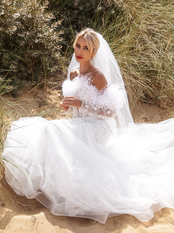 wedding gown  wedding dresses online  wedding dress boutique  wedding dress  storeya  lace wedding dress  feather wedding dress  embroidered wedding dress  cheap wedding dresses  best wedding dresses online  beautiful wedding dresses online  beach wedding dresses  glamorous wedding dresses  luxurious wedding dresses  big wedding dresses  princess wedding dresses  white dresses